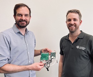 Photo of Nick Bennett and Matt Ryall with Mawson Rovers payload hardware for UTS
